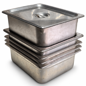 Stack of stainless steel steam table pans with one lid